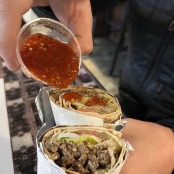 Shawarma Palace - Hot sauce with 20. Beef Shawarma Wrap - Mediterranean Near Me - Milwaukee, Wisconsin Shawarma Palace - Hot sauce with 20. Beef Shawarma Wrap - Mediterranean Near Me - Milwaukee, Wisconsin