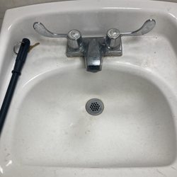 Exxon - Dirty sink , no hand soap , and dirty toilet !