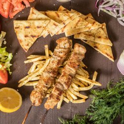 Nick The Greek - Souvlaki Plate marinated skewered and grilled to perfection!