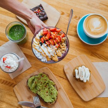 Heart Bowls - person holding a plate of food - Juice Bars & Smoothies Near Me - Sandpoint, Idaho Heart Bowls - person holding a plate of food - Juice Bars & Smoothies Near Me - Sandpoint, Idaho