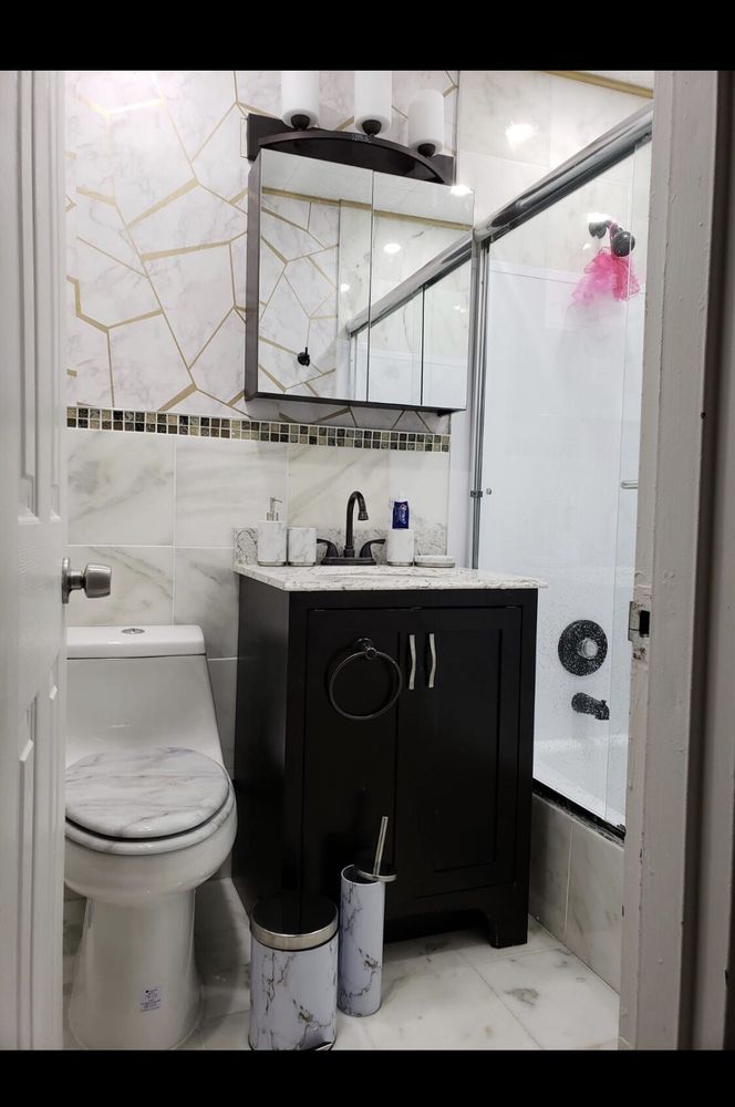 Slide of Mr Fixer NYC