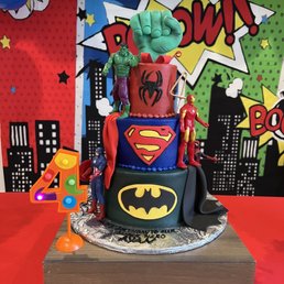 a cake decorated like a superhero a cake decorated like a superhero