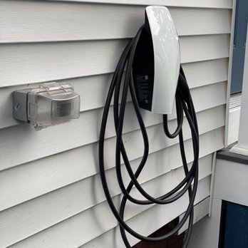 Kuhlman Electric - Tesla Wallcharger- Exterior Install on Vinyl Siding - Electricians Near Me - Danvers, Massachusetts