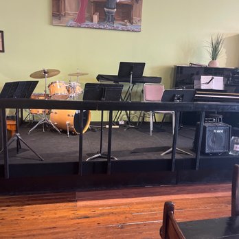 The Ragtime Oriole - a stage with musical instruments - Music Venues Near Me - Marble Falls, Texas