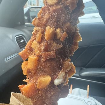 Cutting board CLT - Korean corn dog covered with potatoes sprinkled with light sugar - Food Trucks Near Me - Charlotte, North Carolina Cutting board CLT - Korean corn dog covered with potatoes sprinkled with light sugar - Food Trucks Near Me - Charlotte, North Carolina
