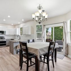 Chris Budka Real Estate - Updated kitchen with granite countertops, refreshed cabinetry, and newer appliances in this South Boise home.