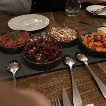 Tangia - a variety of food on a tray - Moroccan Near Me - Montreal, Quebec Tangia - a variety of food on a tray - Moroccan Near Me - Montreal, Quebec