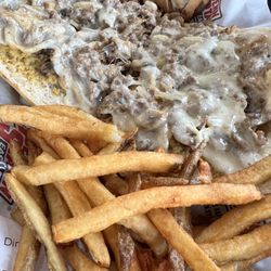 Penn Station East Coast Subs - Cheesesteak-w/onions, mushrooms. Fresh & greasy, must try!
