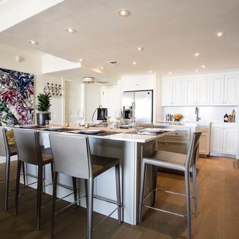 Wyn Wood Floors - a kitchen with a large island - Flooring Near Me - Miami, Florida Wyn Wood Floors - a kitchen with a large island - Flooring Near Me - Miami, Florida