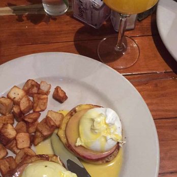 Rathskeller Bistro - Eggs Benedict with Mimosa - New American Near Me - Fredericksburg, Texas