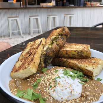 Lost Isle - Charred eggplant dip with grilled bread - Cocktail Bars Near Me - Johns Island, South Carolina Lost Isle - Charred eggplant dip with grilled bread - Cocktail Bars Near Me - Johns Island, South Carolina