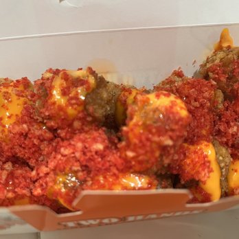 Two Hands Corn Dog - Dirty Fries.  Not fries at all but tater tots with cheese and hot Cheeto powder on top. Tasted fine but they got a little mushy. - Korean Near Me - San Marcos, California