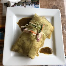 Curry goat roti (comes with potatoes inside) - pretty big portion! Curry goat roti (comes with potatoes inside) - pretty big portion!