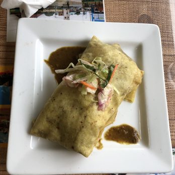 Island Grill - Curry goat roti (comes with potatoes inside) - pretty big portion! - Caribbean Near Me - Ottawa, Ontario Island Grill - Curry goat roti (comes with potatoes inside) - pretty big portion! - Caribbean Near Me - Ottawa, Ontario