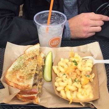 The Melt - The cheesesteak grilled cheese w/ a pickle, trio mac n cheese, and fresh lemonade go so well together! - Sandwiches Near Me - Irvine, California The Melt - The cheesesteak grilled cheese w/ a pickle, trio mac n cheese, and fresh lemonade go so well together! - Sandwiches Near Me - Irvine, California