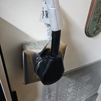 LHP Electrical - Clean install for car charger. Couldn't be recessed because panel is right behind it. - Electricians Near Me