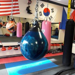 Competitive Edge Karate - Heavy bag training for boxing.