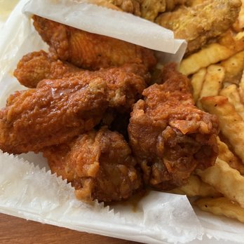 Corner Seafood And Wings - a tray of fried chicken and french fries - Chicken Wings Near Me - Youngsville, Louisiana Corner Seafood And Wings - a tray of fried chicken and french fries - Chicken Wings Near Me - Youngsville, Louisiana