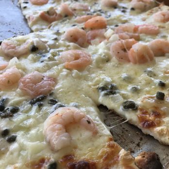 Sweet Tomatoes Pizza - Very bland and soggy white tasteless shrimp pizza w/ onions and capers. There was supposed to be garlic, but it was tasteless. - Pizza Near Me - Needham, Massachusetts