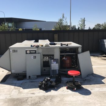 Columbia Heating & AC - Performing a repair on a Trane roof top unit - Heating & Air Conditioning/HVAC Near Me Columbia Heating & AC - Performing a repair on a Trane roof top unit - Heating & Air Conditioning/HVAC Near Me