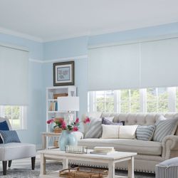Sunburst Shutters & Window Fashions