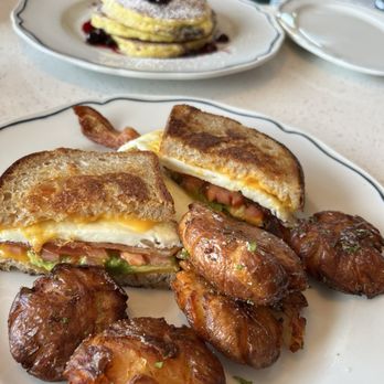 Johnny's - Fried egg sandwich and lemon ricotta pancakes in the rear! - American Near Me - Half Moon Bay, California Johnny's - Fried egg sandwich and lemon ricotta pancakes in the rear! - American Near Me - Half Moon Bay, California