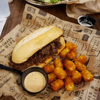 Wayback Burgers - Philly Cheesestake with Cajun tots and Cajun did. - Burgers Near Me - Round Rock, Texas Wayback Burgers - Philly Cheesestake with Cajun tots and Cajun did. - Burgers Near Me - Round Rock, Texas
