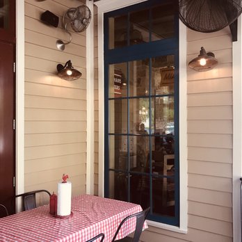 Mia's Table - Outside patio deck to dine.  We were here mid June noon and was very comfortable and cool and no flies ! - American Near Me - Houston, Texas