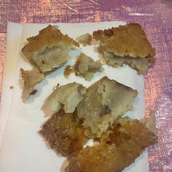 Pete's Fish & Chips - a piece of pizza on a napkin - Seafood Near Me - Phoenix, Arizona