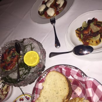 Carbone - Raw tuna on ice, octopus, and caprese. Should've just ate that and left. - Italian Near Me - Las Vegas, Nevada