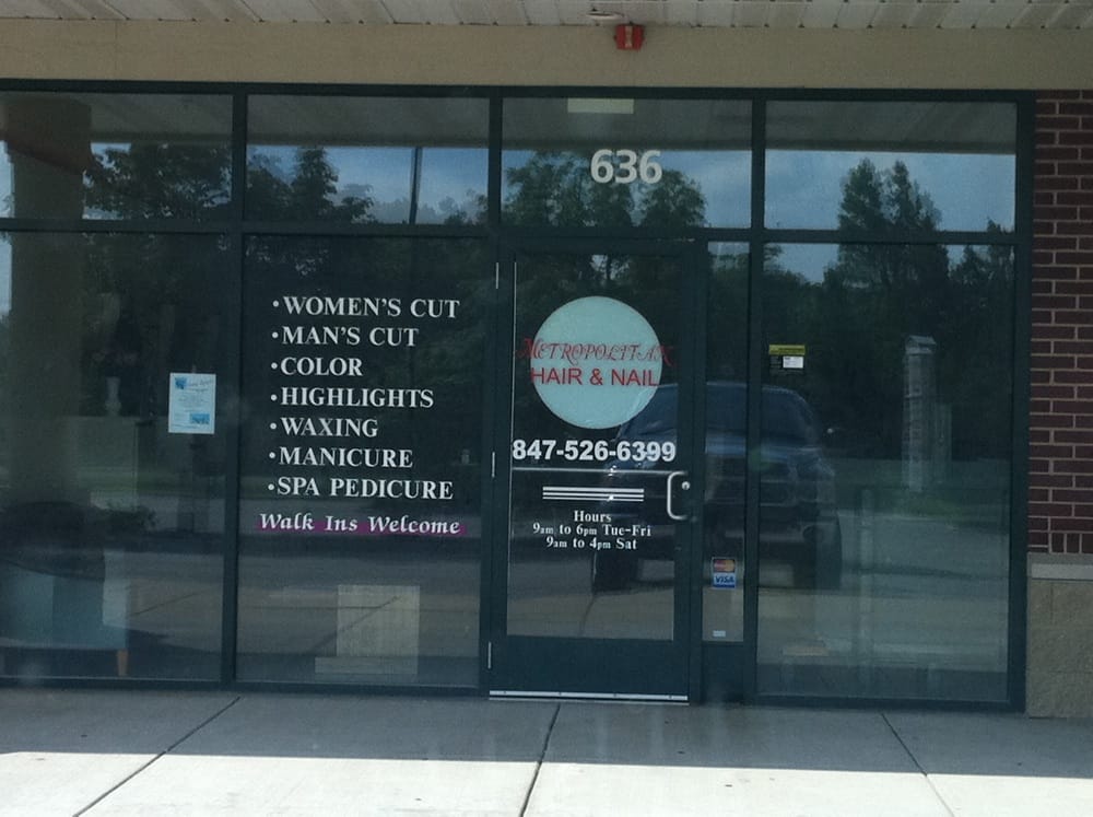 Metropolitan Hair & Nail Logo