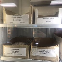 Specialty meats in the freezer section. Alligator, frog legs, and crawfish. Specialty meats in the freezer section. Alligator, frog legs, and crawfish.