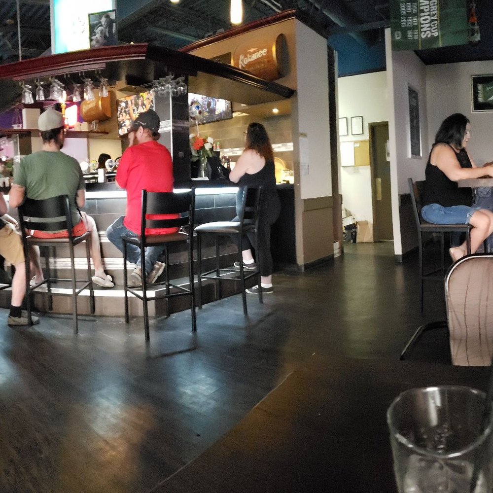 Doyle's Pub - people sitting at the bar - Pubs Near Me - Edmonton, Alberta Doyle's Pub - people sitting at the bar - Pubs Near Me - Edmonton, Alberta