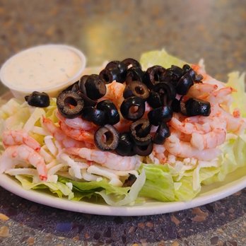 Casa Mia - a plate of salad with shrimp, lettuce and olives - Pizza Near Me - Lacey, Washington Casa Mia - a plate of salad with shrimp, lettuce and olives - Pizza Near Me - Lacey, Washington