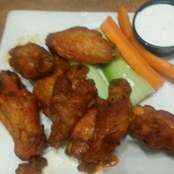 4th & Mill - The fire flavor wings are the bomb! A good spicy kick to them. We were told the source is made from scratch. - American Near Me - Rancho Cucamonga, California 4th & Mill - The fire flavor wings are the bomb! A good spicy kick to them. We were told the source is made from scratch. - American Near Me - Rancho Cucamonga, California