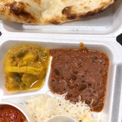 Masala Corner - Veggie dinner combo. Dal mahkni (brown). Paneer mahkni (red). Mahkni veggie of the day (yellow). Gulab Jamun. Naan.