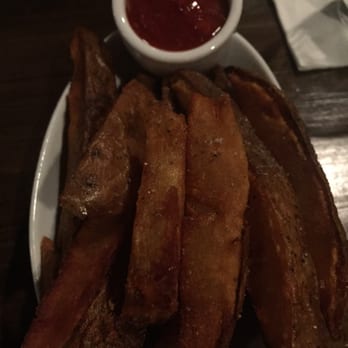 Bosscat Kitchen & Libations - Giant wedges of bosscat fries with chow chow catsup. - New American Near Me - Irvine, California
