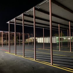 StorageMax Self Storage - Covered Boat and RV parking area at night.