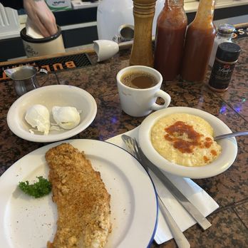 Lucile's Creole Cafe - Pan fried trout, grits, 2 poached eggs, and chicory coffee - Cafes Near Me - Erie, Colorado Lucile's Creole Cafe - Pan fried trout, grits, 2 poached eggs, and chicory coffee - Cafes Near Me - Erie, Colorado