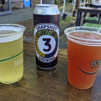 Snapshot Brewing - three beers on a table - Breweries Near Me - Seattle, Washington