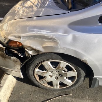 Kim's Auto Body - Before repairs showing major bumper, fender, and headlight damage - Body Shops Near Me - Santa Clara, California