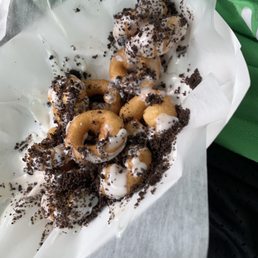 a pile of doughnuts on a napkin a pile of doughnuts on a napkin