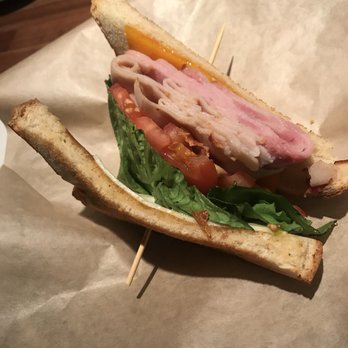 Cheddar's Scratch Kitchen - Half a club sandwich. This is how it was delivered to me and it was awful. Took one bite and I was done. Gross. - American Near Me - Albuquerque, New Mexico