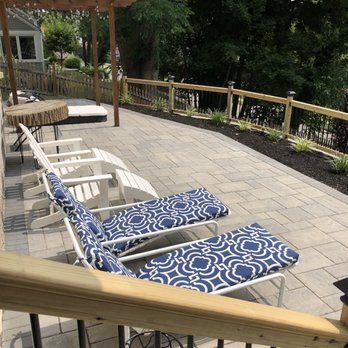 John Brothers Construction - a deck with lounge chairs - General Contractors Near Me - Orange, New Jersey
