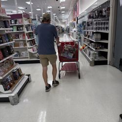 Target - Not allowing me to get product and I'm behind him in line. He is waiting for his friend to show up to pass off the items. 2 per item limit