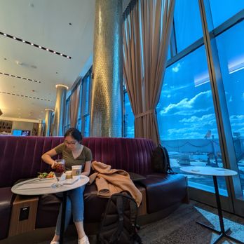 Delta Sky Club - Inside the Delta Sky Club near Gate M13 inside Terminal 5 at Chicago O'Hare International Airport (ORD). One of many seating areas. - Airport Lounges Near Me - Chicago, Illinois Delta Sky Club - Inside the Delta Sky Club near Gate M13 inside Terminal 5 at Chicago O'Hare International Airport (ORD). One of many seating areas. - Airport Lounges Near Me - Chicago, Illinois