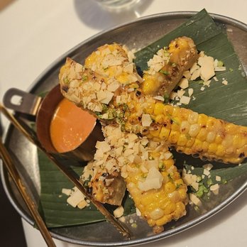 BoBo Thai - Grilled Corn - Grilled sweet corn with fresh Thai herb sauce. - Thai Near Me - Los Angeles, California BoBo Thai - Grilled Corn - Grilled sweet corn with fresh Thai herb sauce. - Thai Near Me - Los Angeles, California