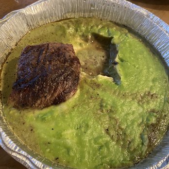Tango Sur - El Filet - forgot to take pic before taking one steak out - Latin American Near Me - Chicago, Illinois