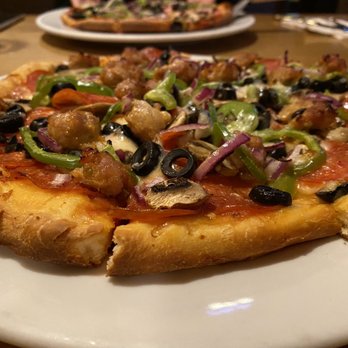 Pinocchio's Pizza - Combination Pizza: Pepperoni, Sausage, Mushrooms, Peppers and Black Olives. - Pizza Near Me - Pasadena, California