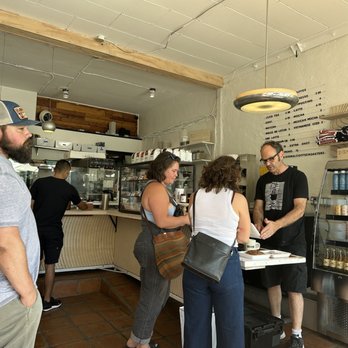 SIGNAL Coffee Roasters - a group of people in a coffee shop - Coffee Roasteries Near Me - Berkeley, California